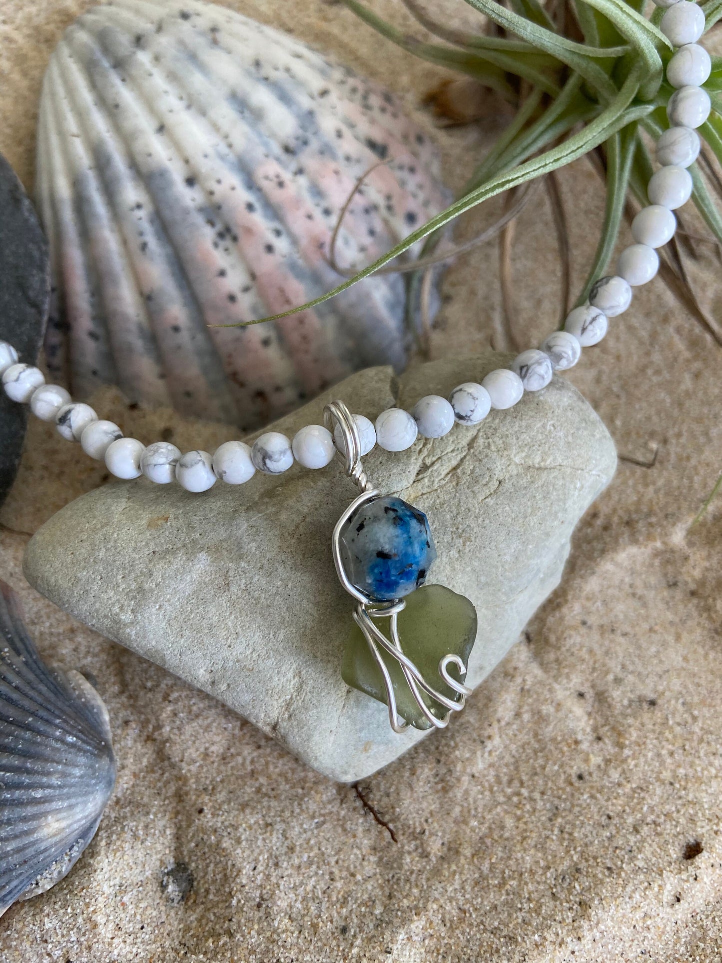 K2 crystal stone and Sea Glass intertwined in solid sterling silver to create a wonderful unique pendant with beautiful energies.