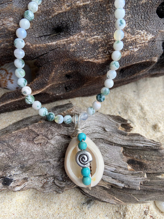 Cowrie shell  pendant wrapped in sterling silver designed with tiny turquoise coloured bead detail, Tree Agate gemstone necklace.